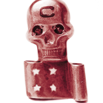 metal pin of a skull and a scroll
