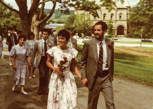 Deborah Springhorn and Steve Silver at their wedding, with James B. Colgate Hall in the background