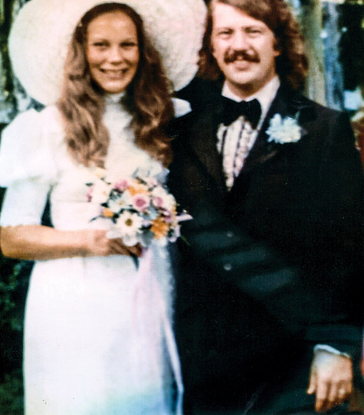 Couple in 70s-style wedding attire