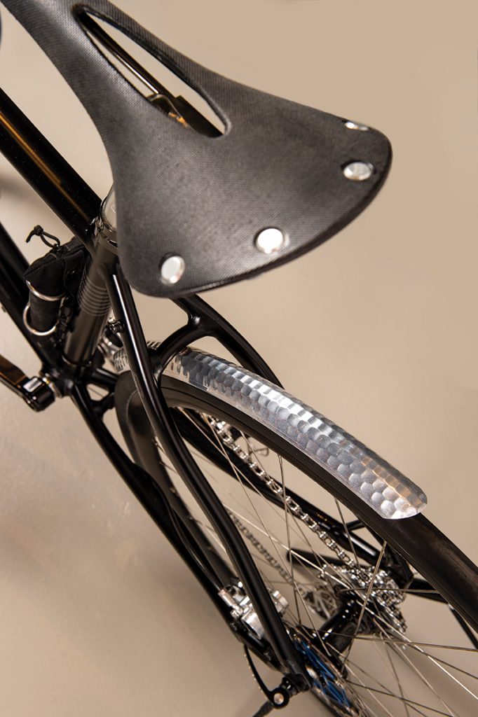Close up of a black and chrome bike