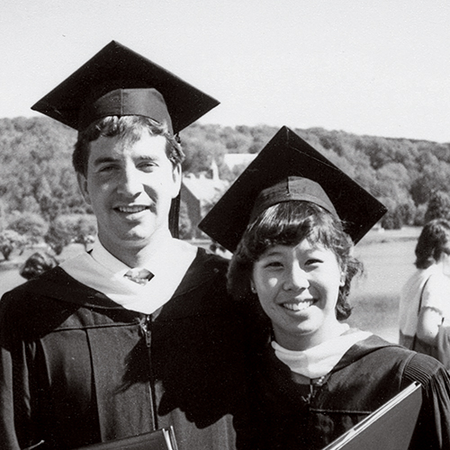 Christine and Jos in cap and gown at their Colgate graduation