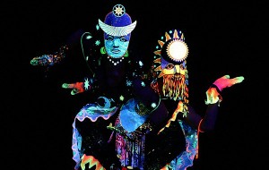 Deep Blue Show featuring colorful costumes and performing dancers.