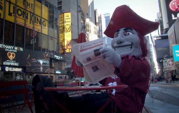 Raider reading the Maroon News in Times Square
