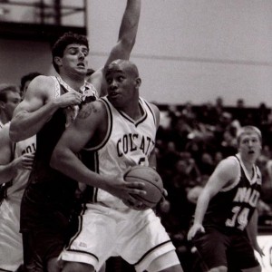 Howard Blue driving on the basket during a game in his Colgate Basketball career