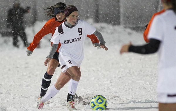 Caroline Brawner ’15 playing soccer in snowstorm