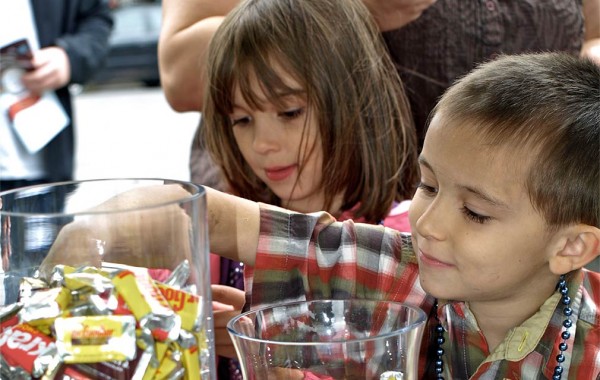 Children reach for bite-size chocolate bars