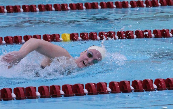 Morgan Cohara ’16 swimming in competition