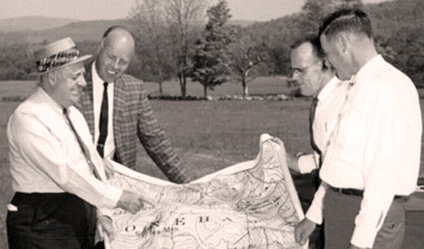 Robert Trent Jones and others review plans for the course