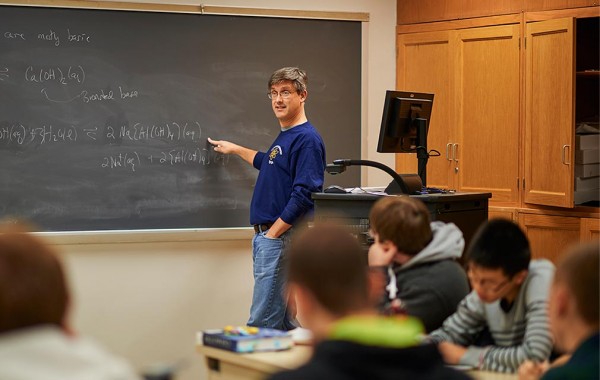 Professor Ephraim Woods teaching at the blackboard