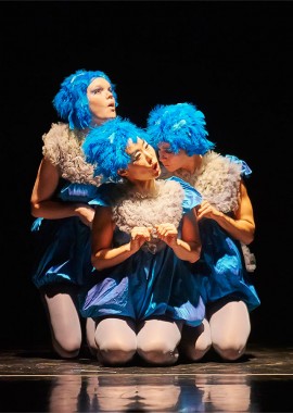 Students in baby bird costumes during theater production