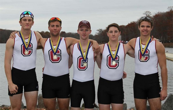 Men's rowing team with medals