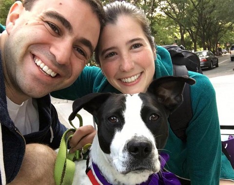 Jess Blank ’11 and Adam Weisbarth ’10 with a foster dog