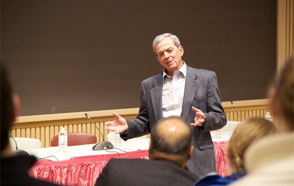 Dr. Michael Wolk ’60 talks with students about the challenges facing the American health care system.
