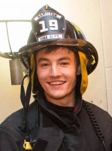 Adam Pratt in firefighting gear
