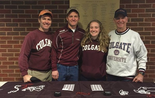 Three Colgate generations pictured in Colgate gear