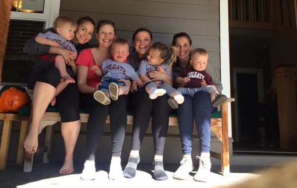 Alumnae mothers with their children dressed in Colgate gear