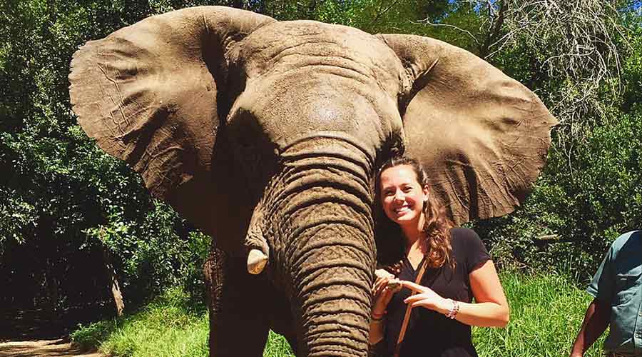 Sally Langan ’17, a sociology major, poses with an elephant in Cape Town.
