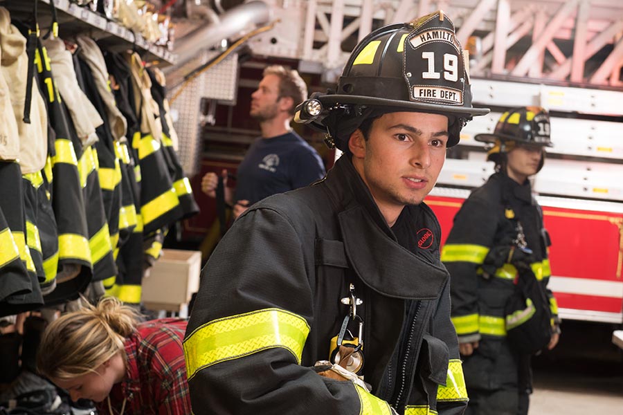  Jon Delman ’18 in Hamilton Fire Department uniform and helmet