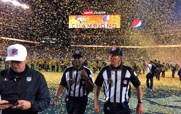 Walking off the field as one of the refs of the Super Bowl 50 game.