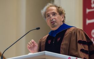 Peter Balakian reciting a poem at President Casey's inauguration in the Chapel
