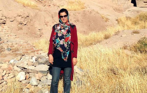 Naseema Noor ’06 in dry Afghanistan landscrap