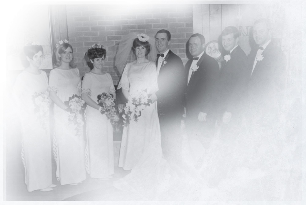 Wedding photo, with Janet and Steve flanked by the bridal party