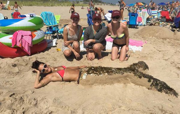 It’s no tall tail: (L to R) Meghan Fogarty ’13, Amanda Harris ’13, and Maddie Bell ’13 won first place in a sandcastle competition in Rhode Island last summer. 
