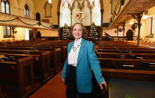 Marti Swords-Horrell ’77 in her church's sanctuary