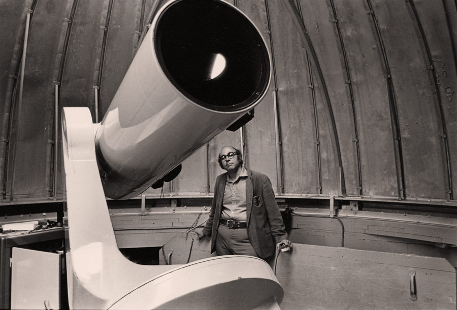 Tony Aveni with a telescope in an observatory