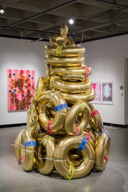 Sculpture of stacked gold rings