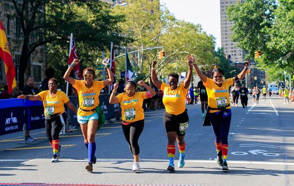 Zakia Haywood '97 and others running in a race