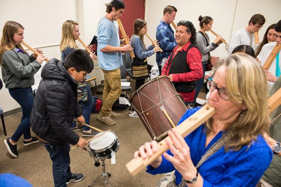 Students and professors practicing with Bolivian instruments