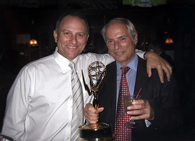 C Fager and Bob Simon celebrating an Emmy win.
