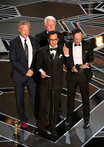 David Fialkow '81 and colleagues accepting Academy Award