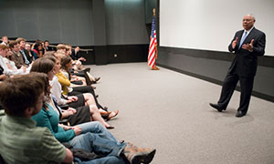 Colin Powell speaks with Colgate University students in Golden Auditorium