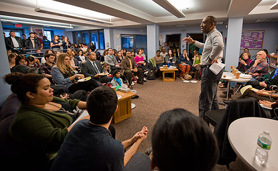 Students, faculty, and staff fill the Center for Women's Studies to hear Professor Brian Moore present at last year's MLK Week