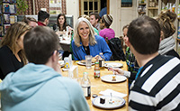 Writer and activist Robyn Ochs, who was the keynote speaker for QueerFest 2013, dines with students. 