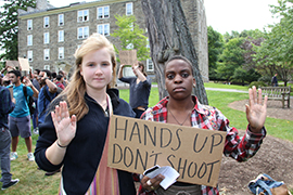 "Hands up, don't shoot" has become a slogan at protests around the country.
