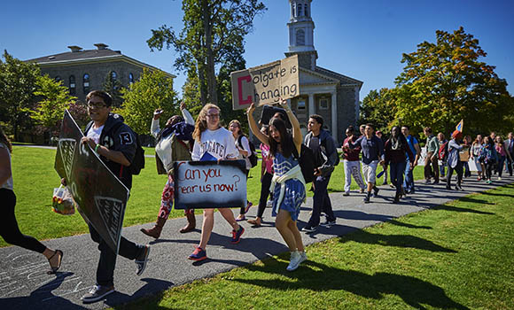 Students celebrate the conclusion of a 100-hour sit-in Friday, September 26. 