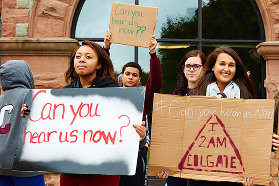 Students demonstrate outside James B. Colgate Hall