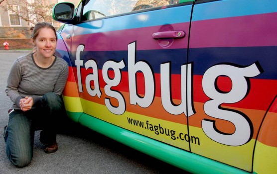 LGBTQ advocate Erin Davies poses with her "fagbug" car.