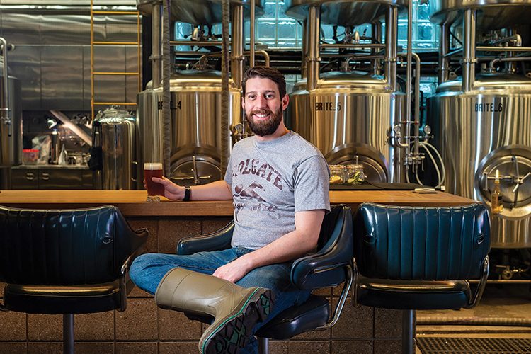 Drew Kostic '08 in a brewery taproom