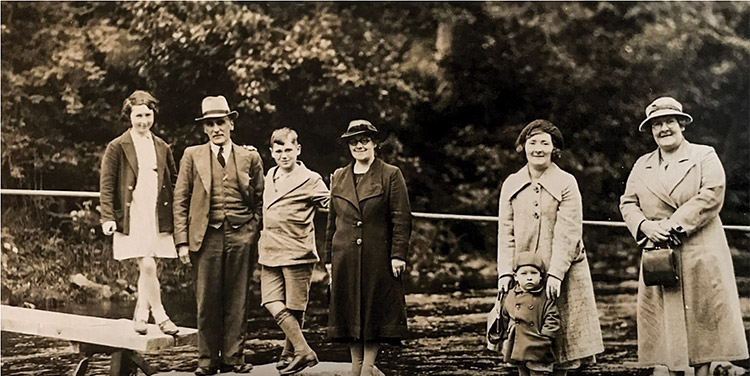 Old Photo of family in front of river