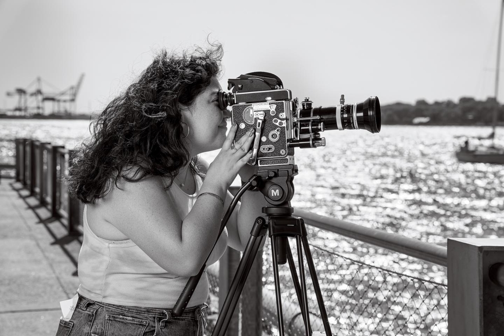  Jen Trujillo ’22 takes an image with a vintage camera.