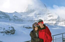 John Jr. ’14 and Sarah Kistner ’14 McCoy posing in front of mountain