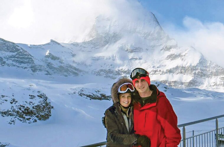 John Jr. ’14 and Sarah Kistner ’14 McCoy posing in front of mountain