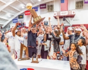Colgate mens basketball with a trophy