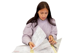A student prepares tax materials