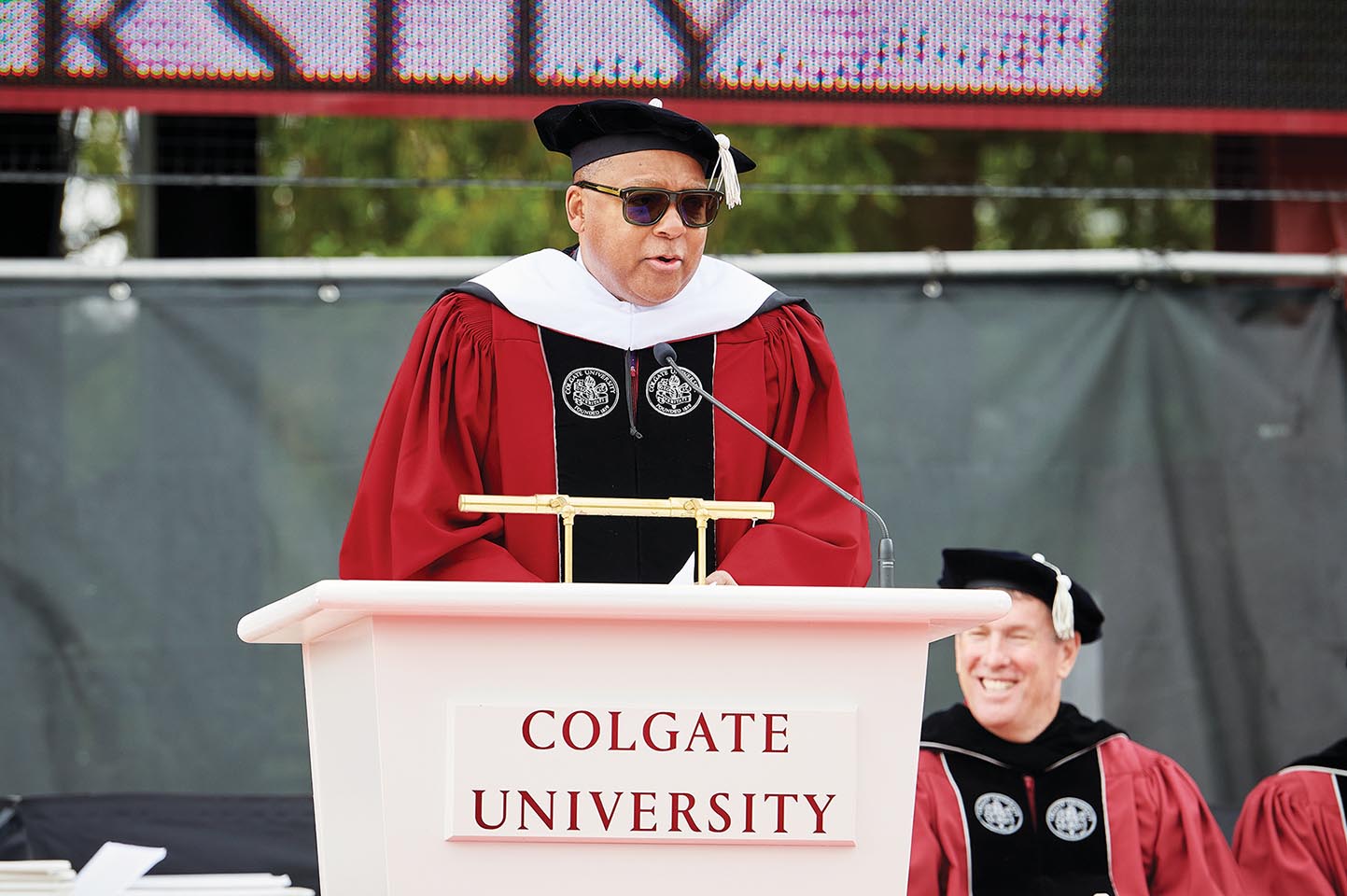 Wynton Marsalis, dressed in commencement robe and sunglasses, gives the 2023 commencement speech.