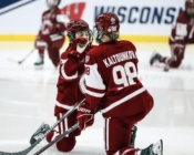 Two Colgate women's hockey players on the ice
